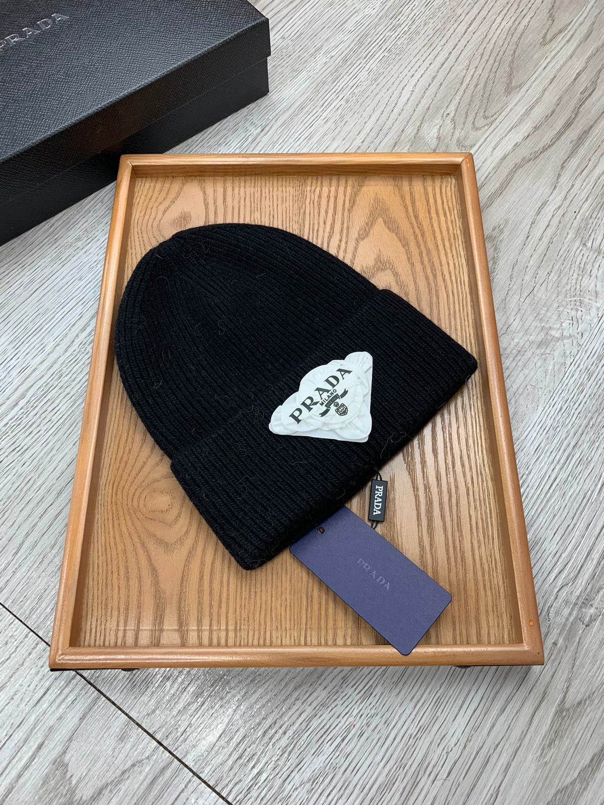 PRADA BEANIE HAT IN BLACK WOOL 431357
