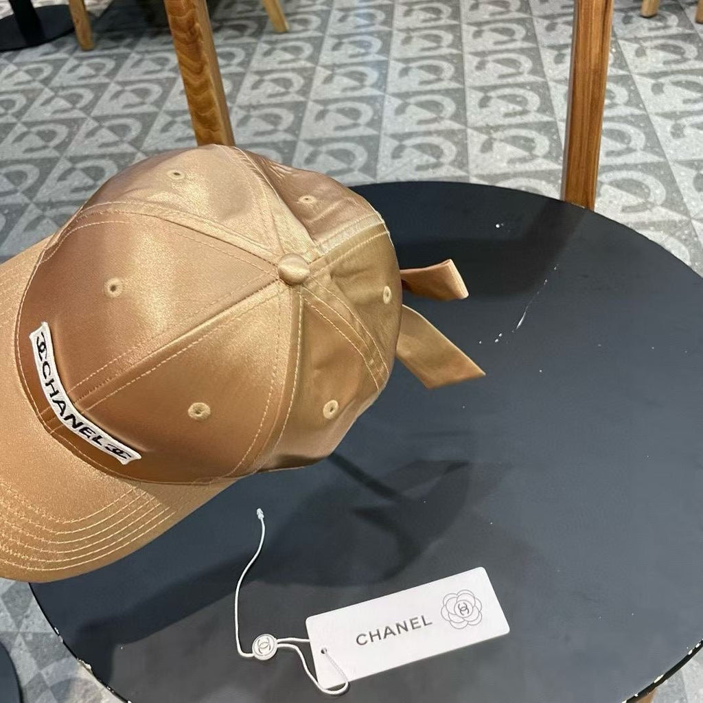 CHANEL BASEBALL HAT IN GOLD SILK SATIN 404866